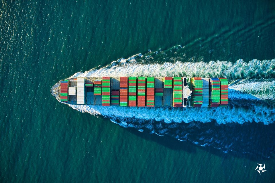 A container ship carrying hundreds of containers